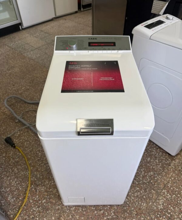 "AEG", GERMANY,Polovna ves masina, Top Load punjenje, 7kg ,1200obrtaja, prevoz ukljucen u cenu