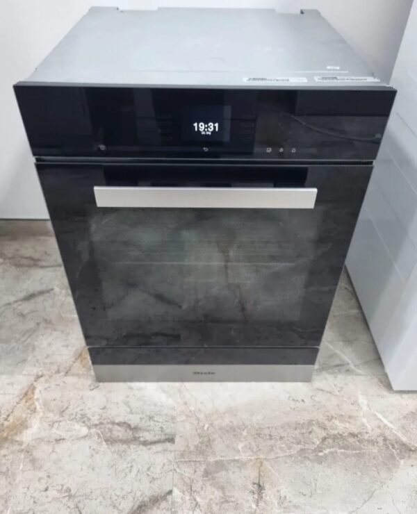"Miele Dgc 6660", polovna ugradna kombinovana rerna sa grejnom fiokom, 77x55x58cm, garancija 6 meseci, moguc prevoz, uvoz CH